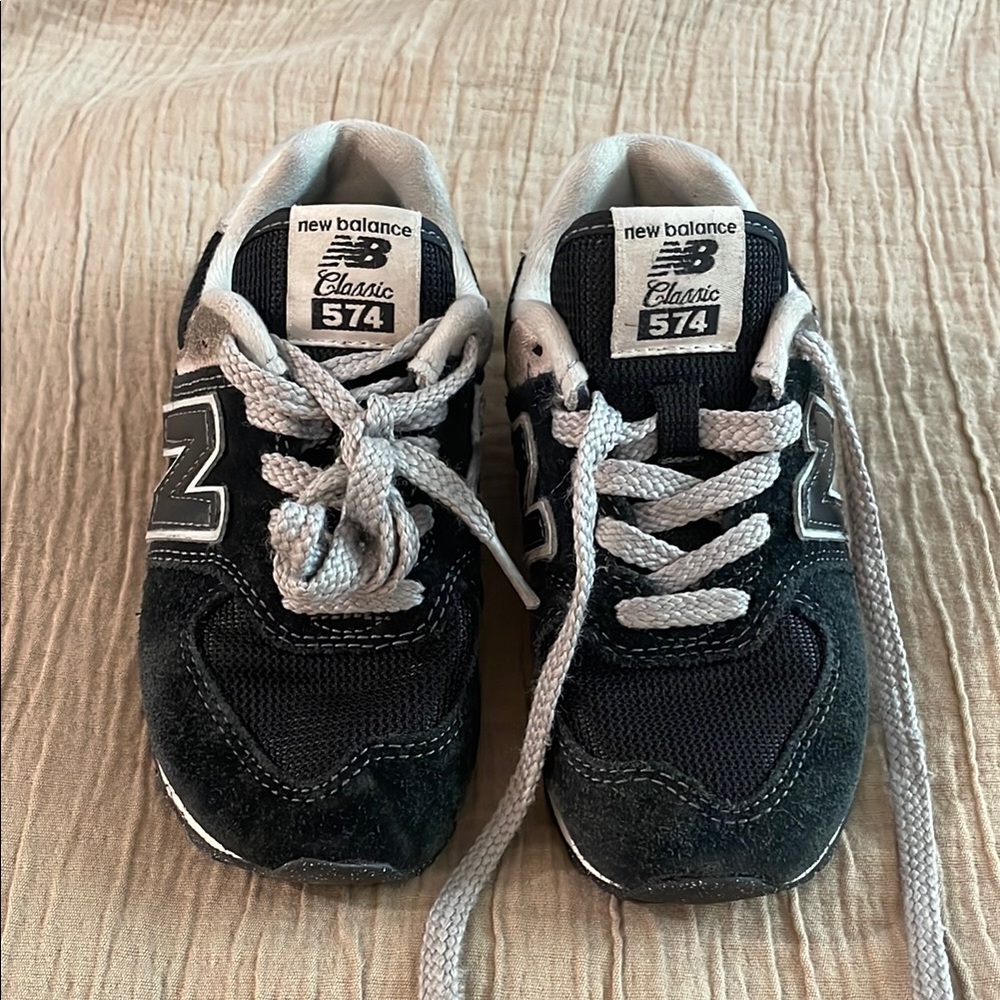 New Balance 574 Black and White Sneakers with Iconic Design